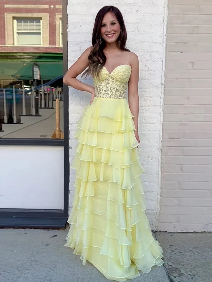 Robe de soirée bustier jaune en mousseline à dentelle superposée