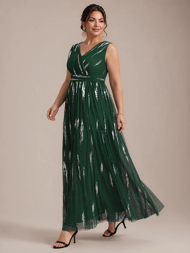 Robe longue sans manches en tulle à paillettes drapé