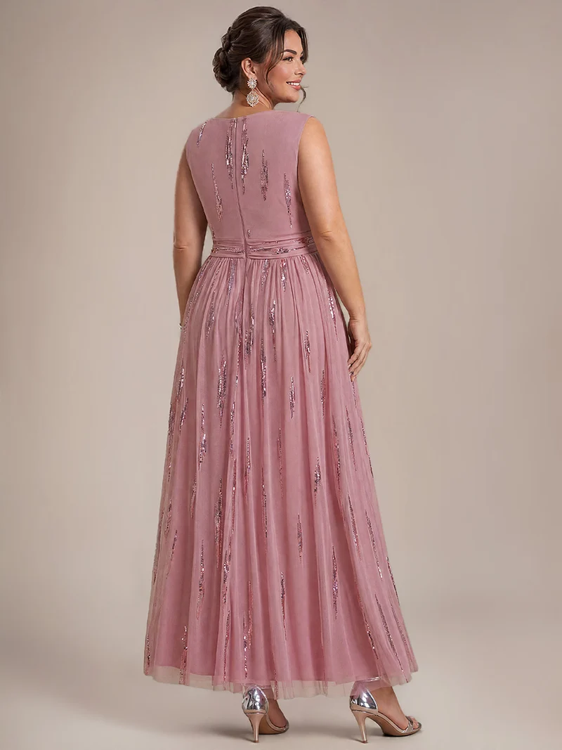 Robe longue sans manches en tulle à paillettes drapé