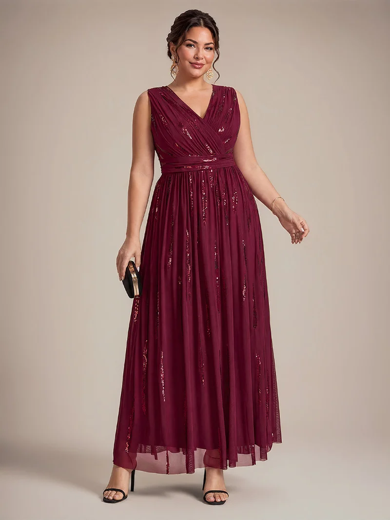 Robe longue sans manches en tulle à paillettes drapé