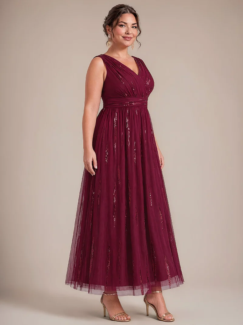 Robe longue sans manches en tulle à paillettes drapé