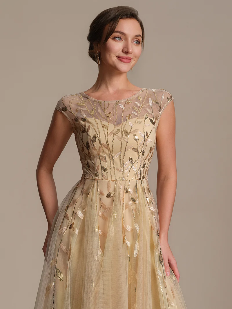 Robe de soirée mi-longue à paillettes avec manches cape