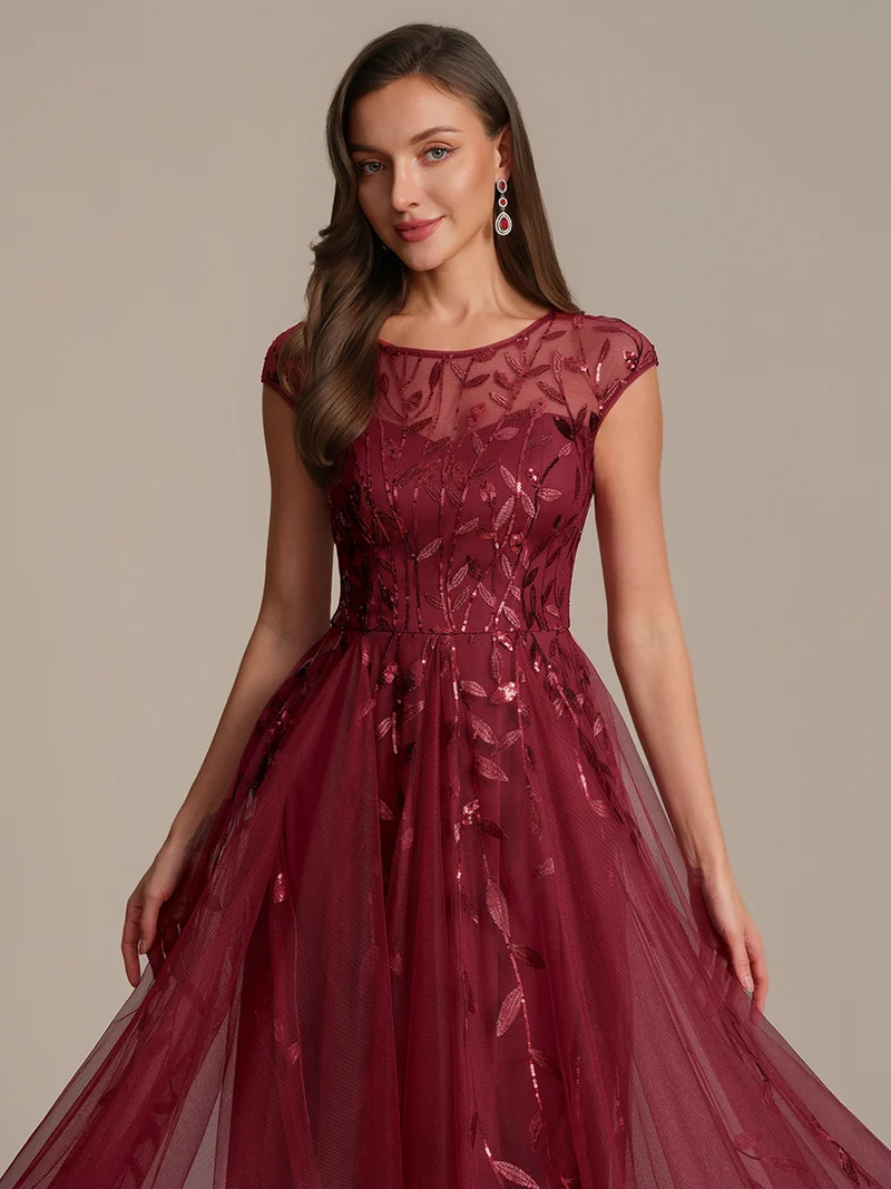 Robe de soirée mi-longue à paillettes avec manches cape