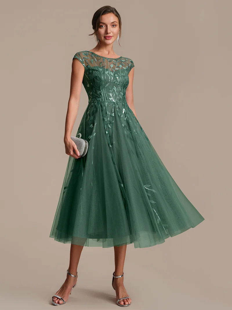 Robe de soirée mi-longue à paillettes avec manches cape
