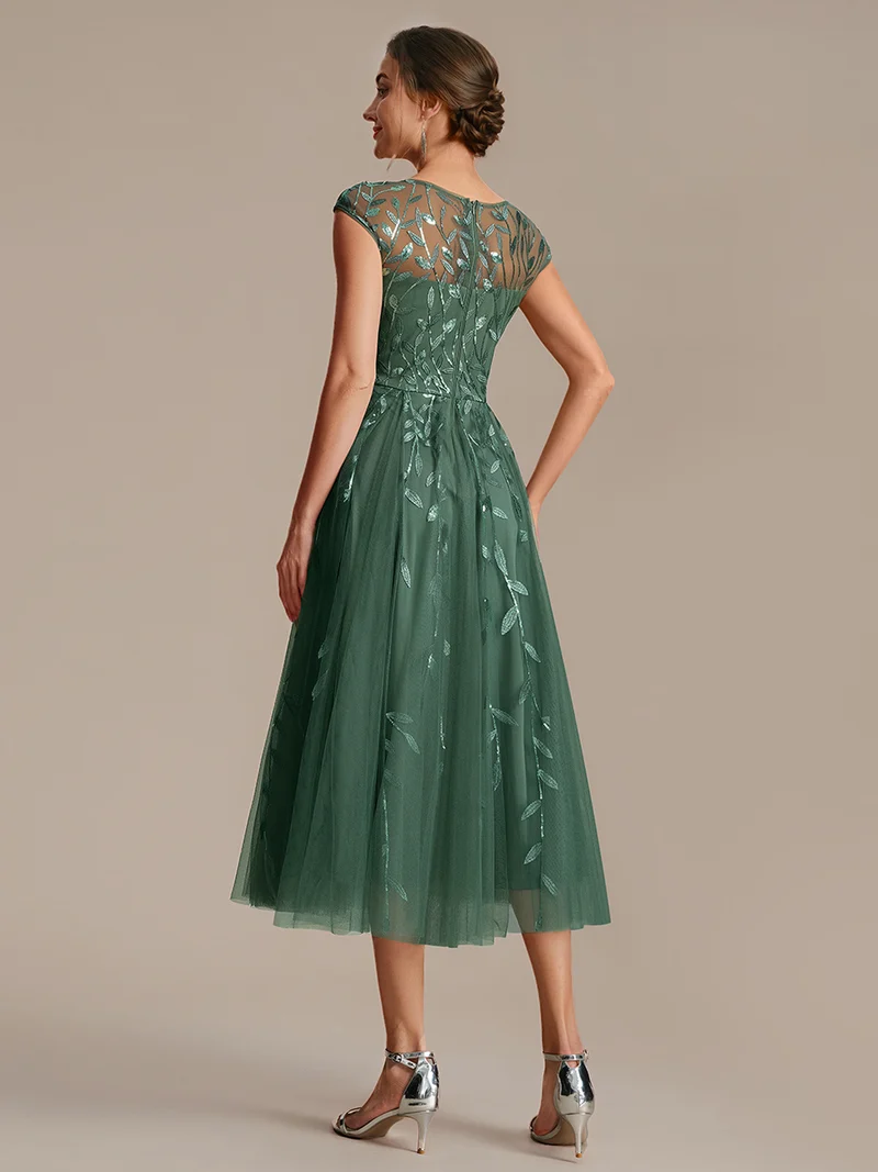 Robe de soirée mi-longue à paillettes avec manches cape