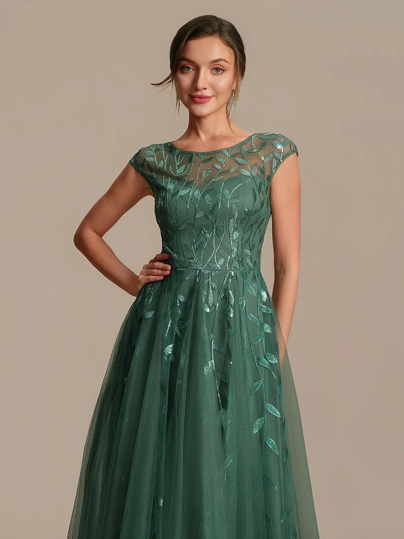 Robe de soirée mi-longue à paillettes avec manches cape
