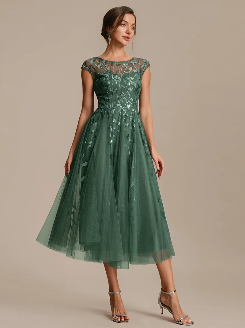 Robe de soirée mi-longue à paillettes avec manches cape
