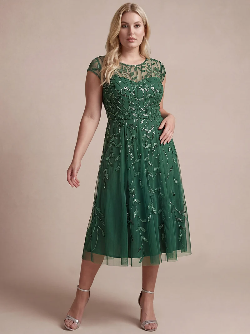 Robe de soirée mi-longue à paillettes avec manches cape