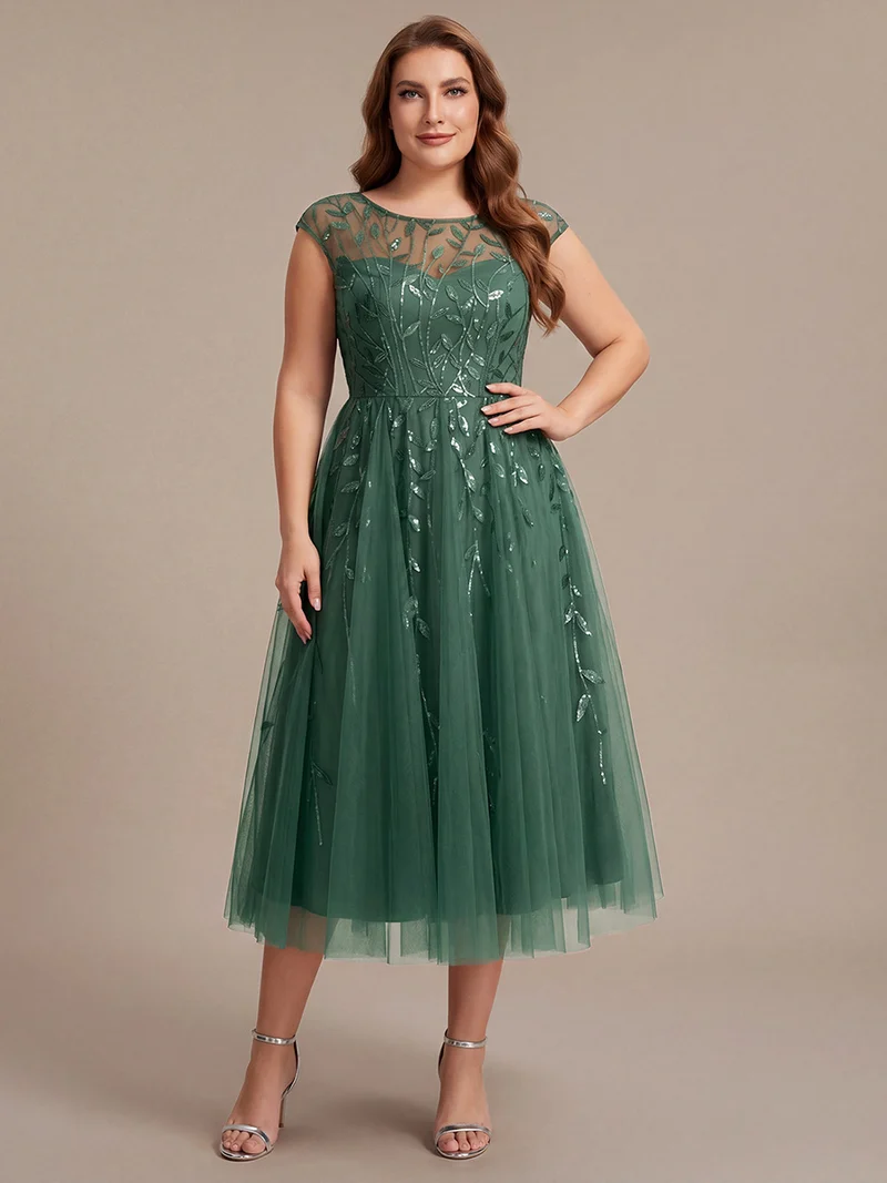 Robe de soirée mi-longue à paillettes avec manches cape
