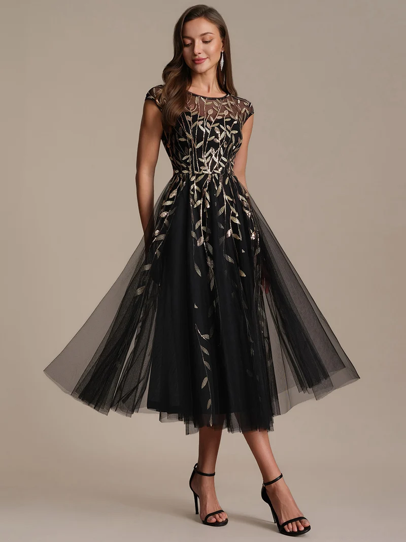 Robe de soirée mi-longue à paillettes avec manches cape