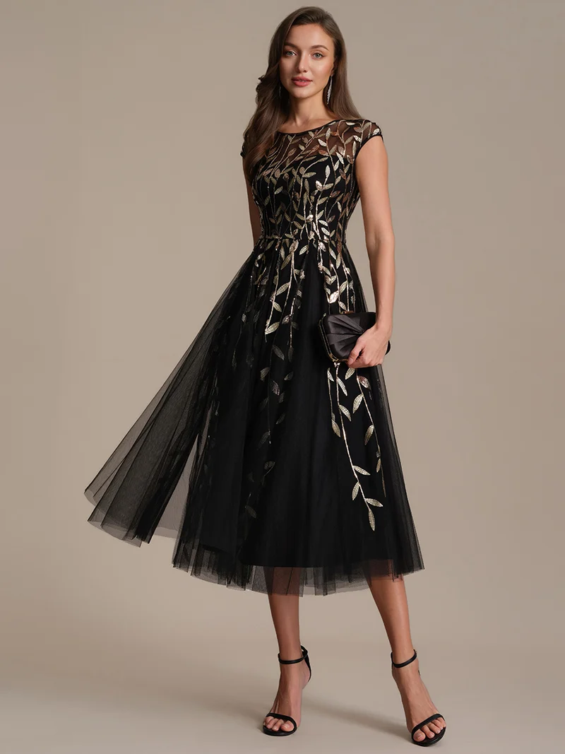 Robe de soirée mi-longue à paillettes avec manches cape