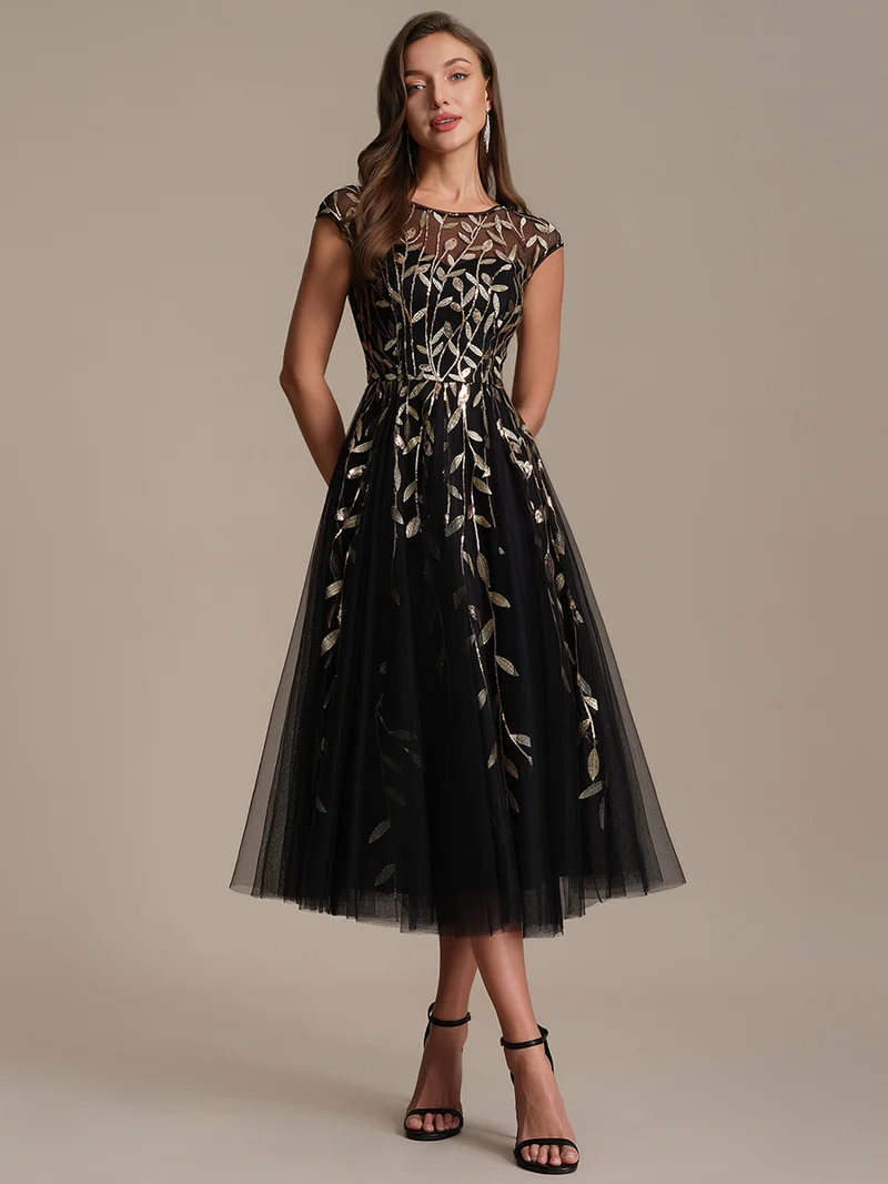 Robe de soirée mi-longue à paillettes avec manches cape