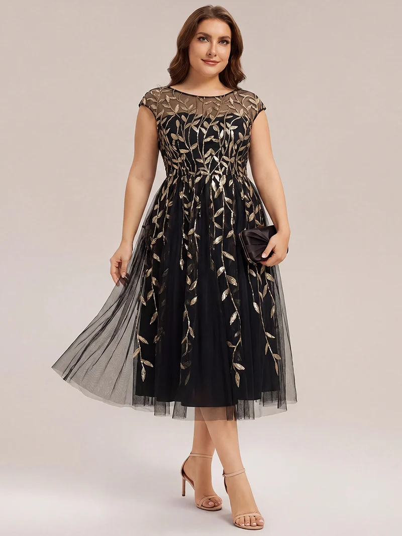 Robe invitée mariage grande taille à paillettes coupe trapèze