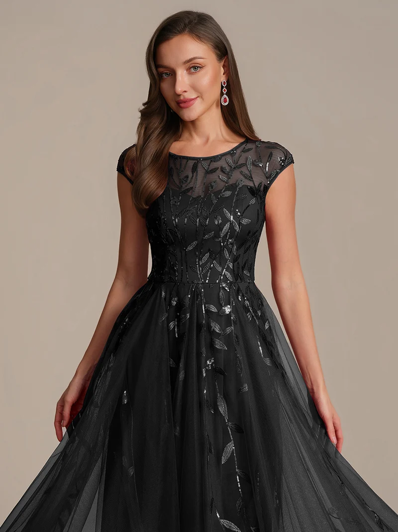 Robe de soirée mi-longue à paillettes avec manches cape