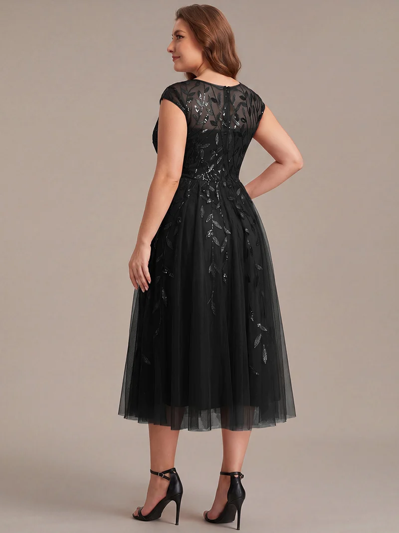 Robe invitée mariage grande taille à paillettes coupe trapèze