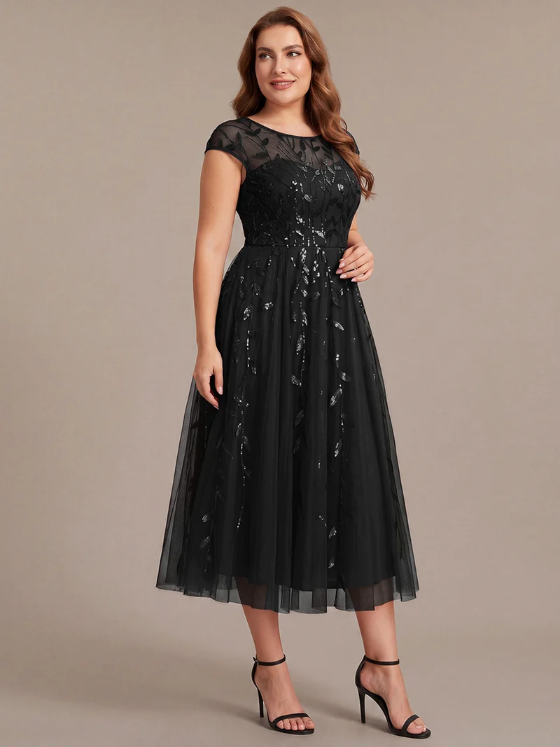 Robe invitée mariage grande taille à paillettes coupe trapèze