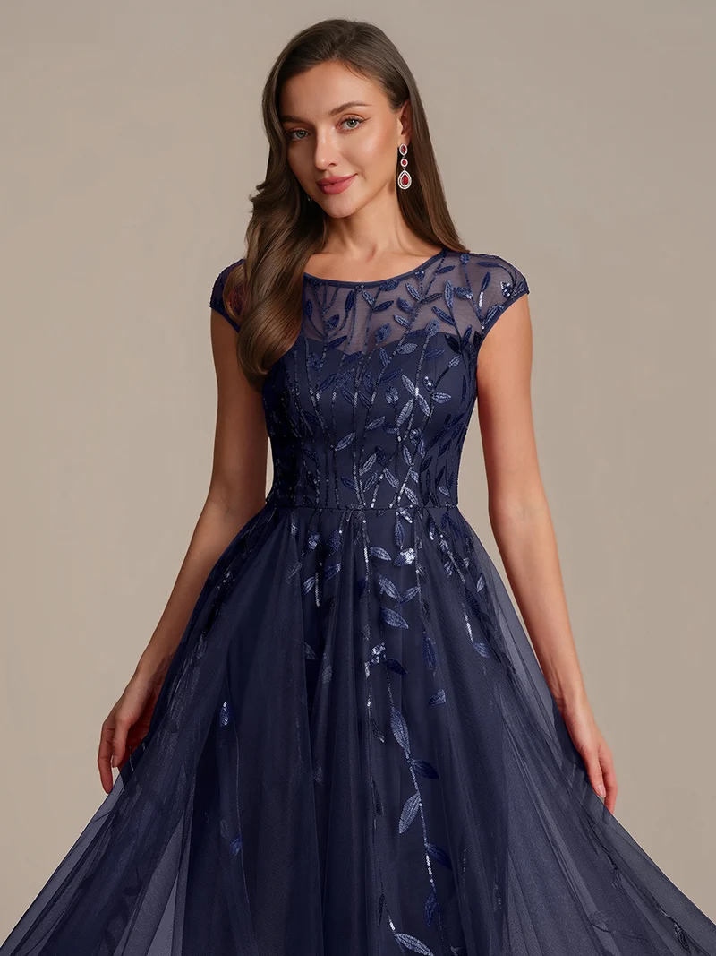 Robe de soirée mi-longue à paillettes avec manches cape