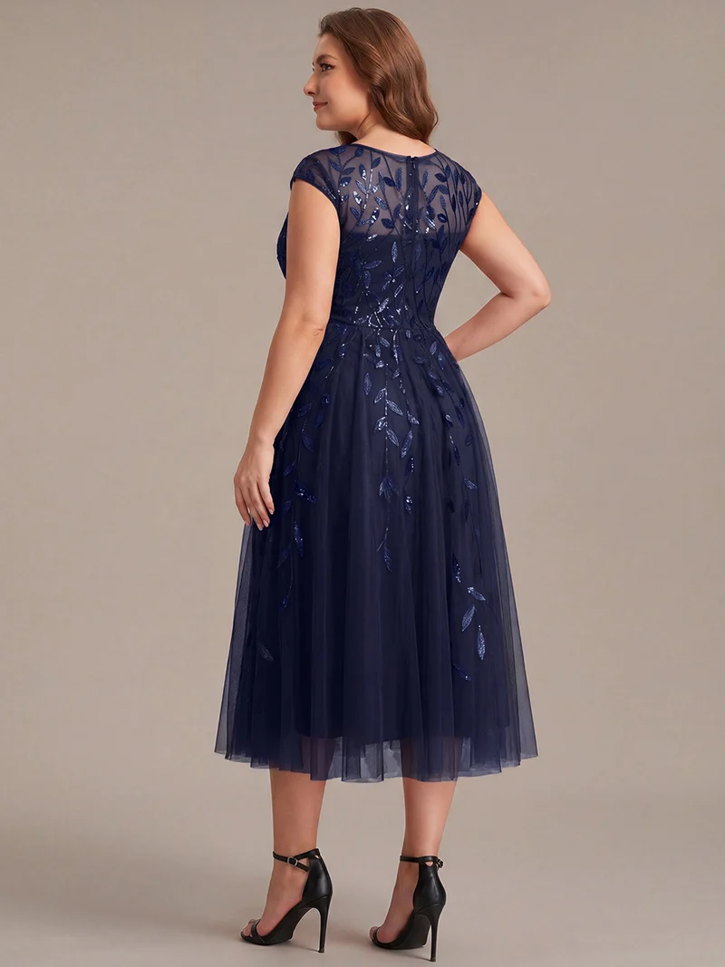 Robe invitée mariage grande taille à paillettes coupe trapèze