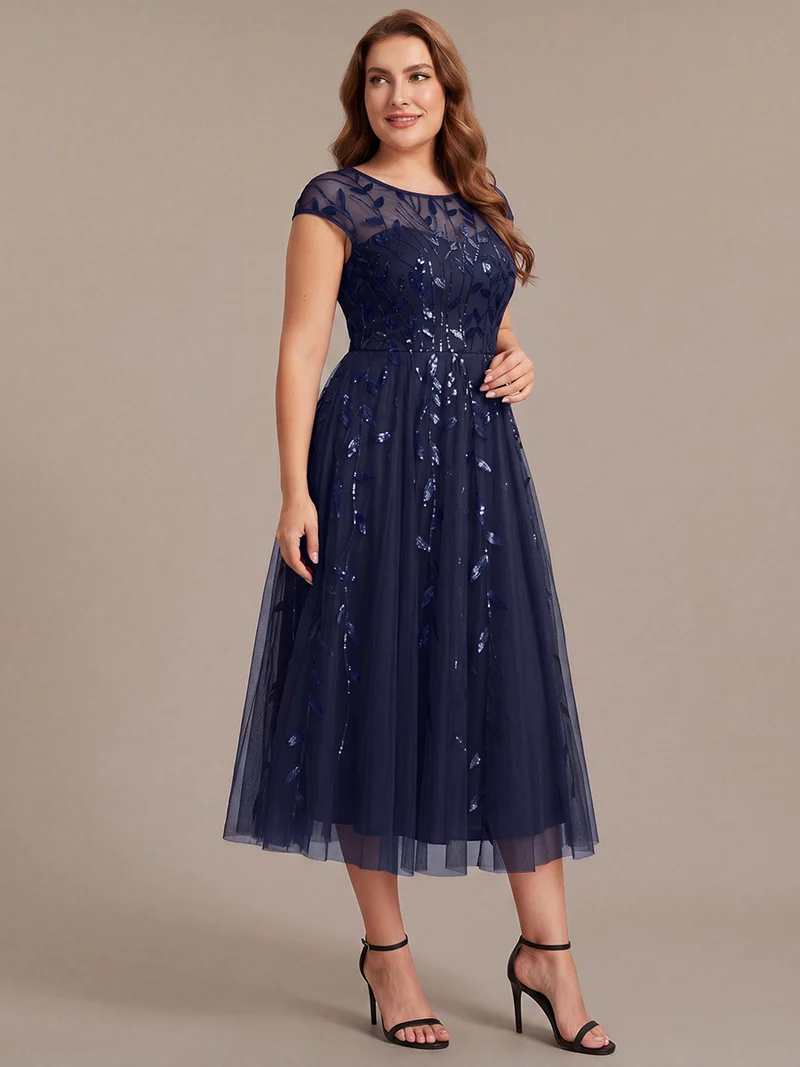 Robe invitée mariage grande taille à paillettes coupe trapèze