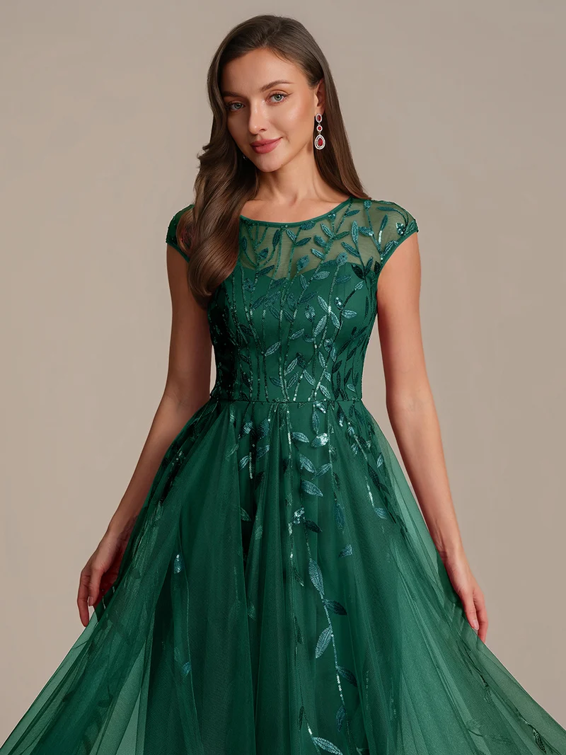 Robe de soirée mi-longue à paillettes avec manches cape