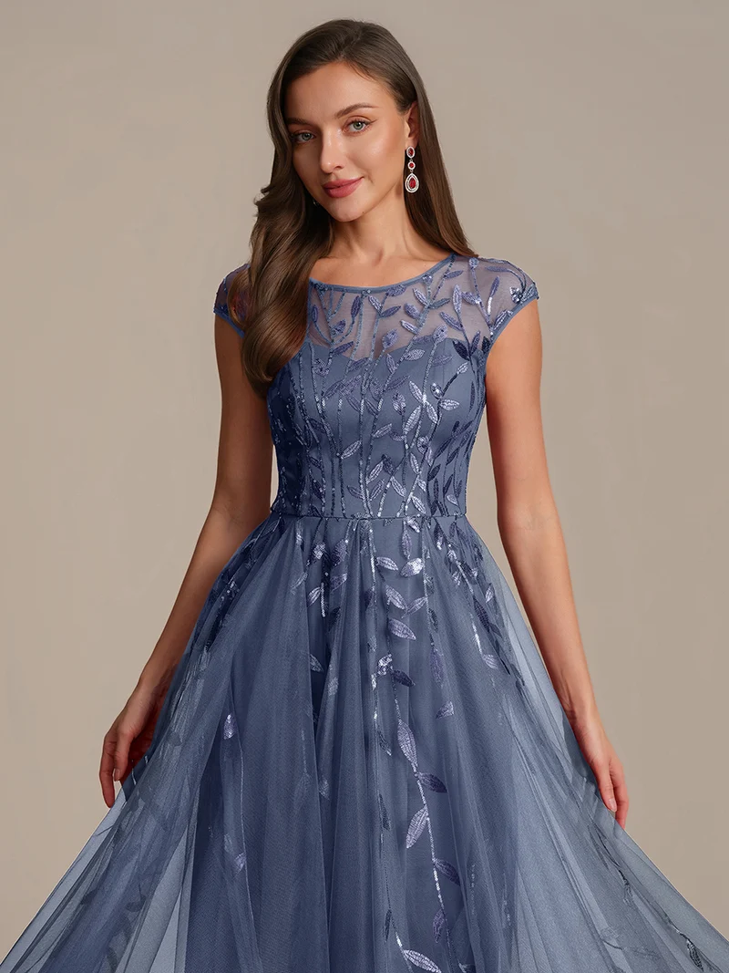 Robe de soirée mi-longue à paillettes avec manches cape