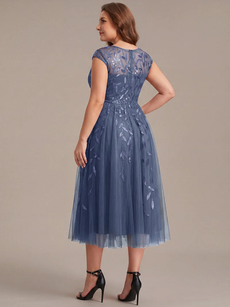 Robe invitée mariage grande taille à paillettes coupe trapèze