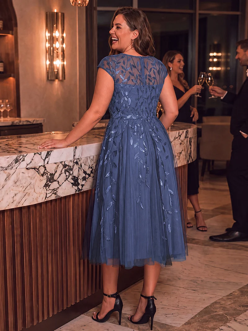 Robe invitée mariage grande taille à paillettes coupe trapèze