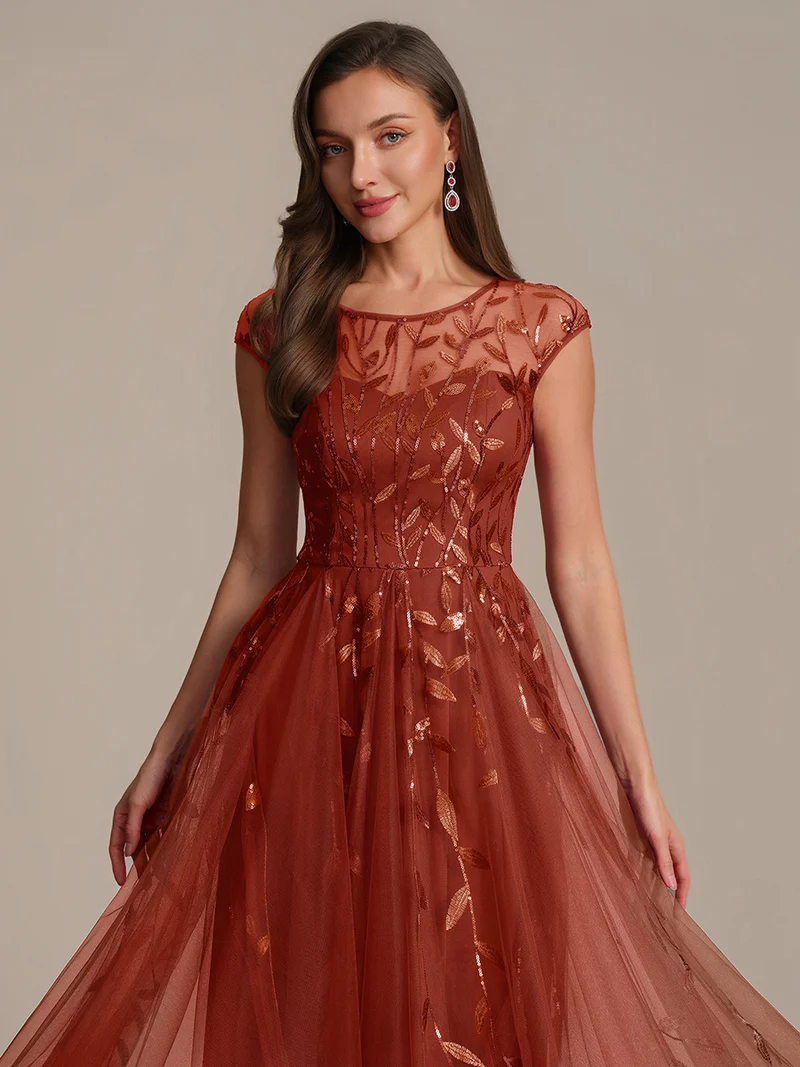 Robe de soirée mi-longue à paillettes avec manches cape