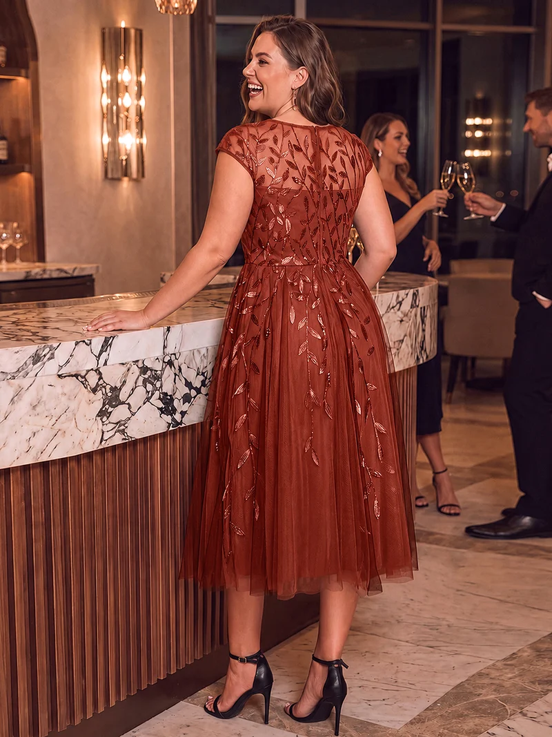 Robe invitée mariage grande taille à paillettes coupe trapèze