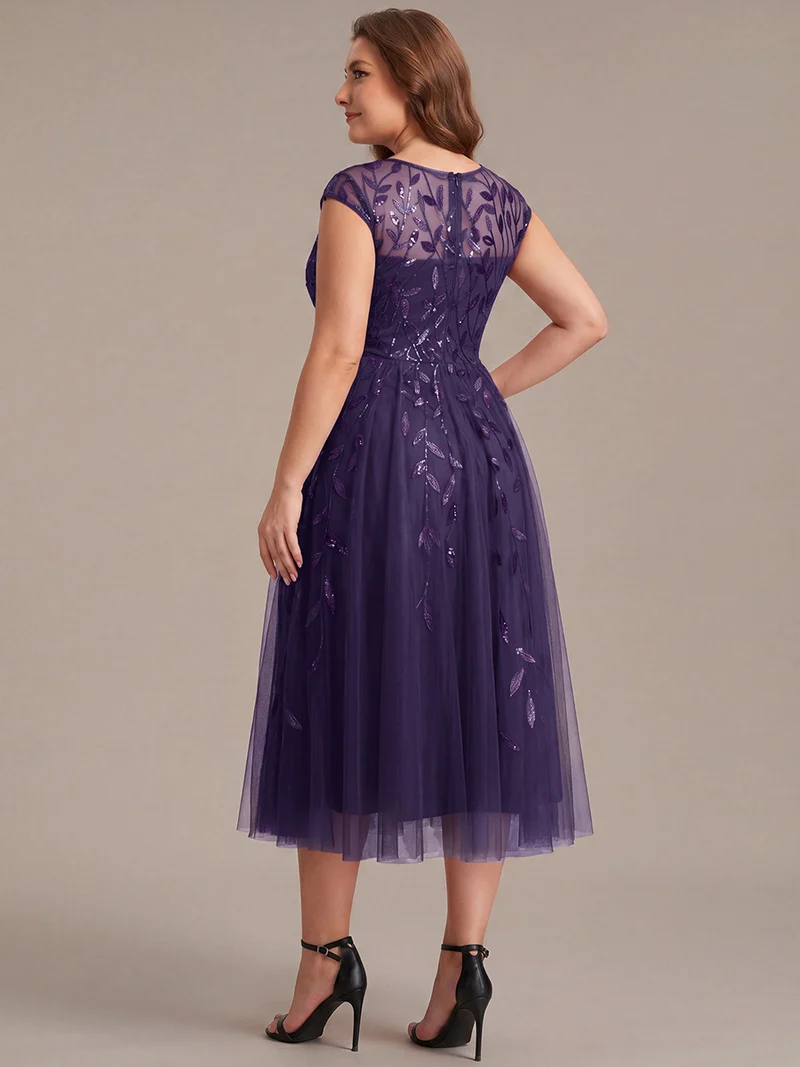 Robe invitée mariage grande taille à paillettes coupe trapèze