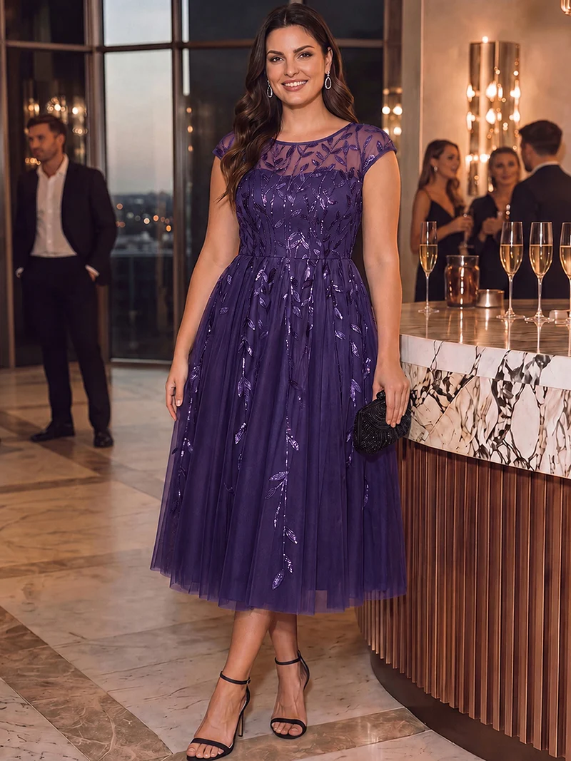 Robe de soirée mi-longue à paillettes avec manches cape