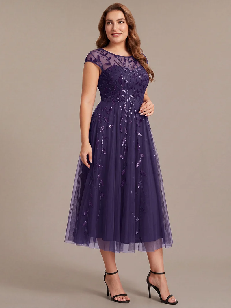 Robe invitée mariage grande taille à paillettes coupe trapèze