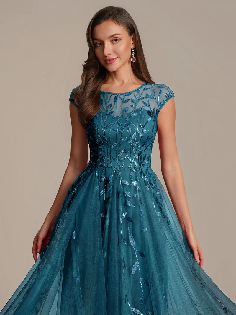 Robe de soirée mi-longue à paillettes avec manches cape