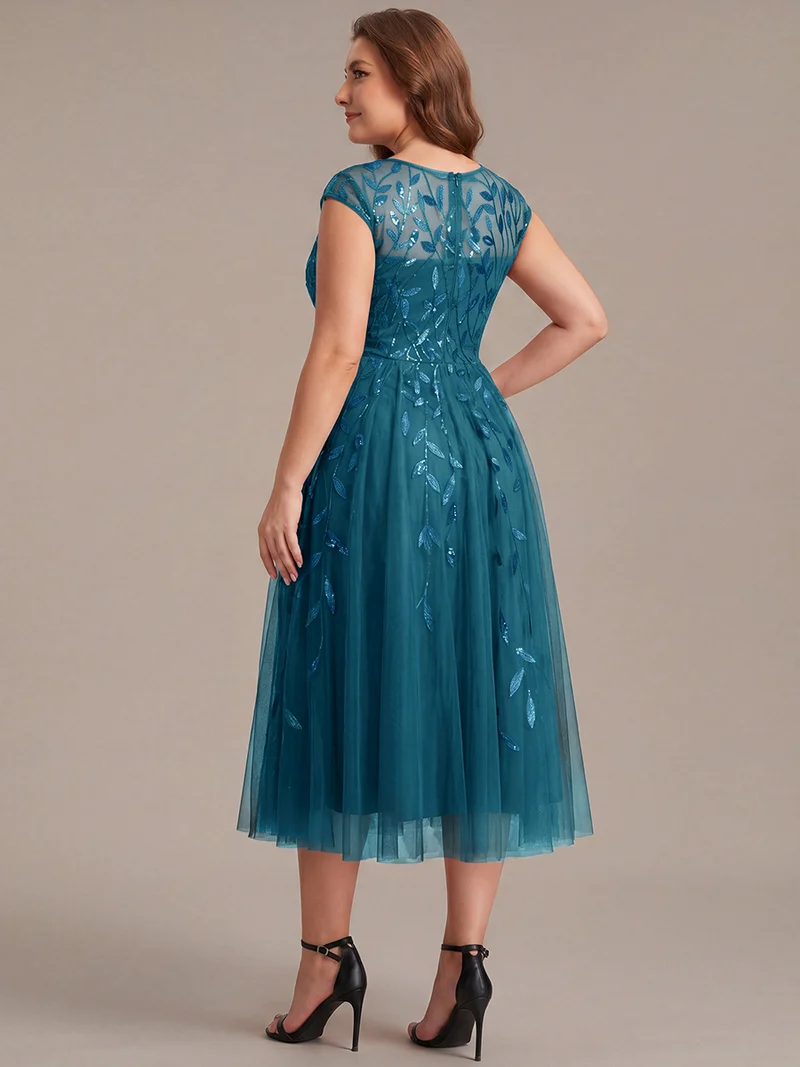 Robe invitée mariage grande taille à paillettes coupe trapèze