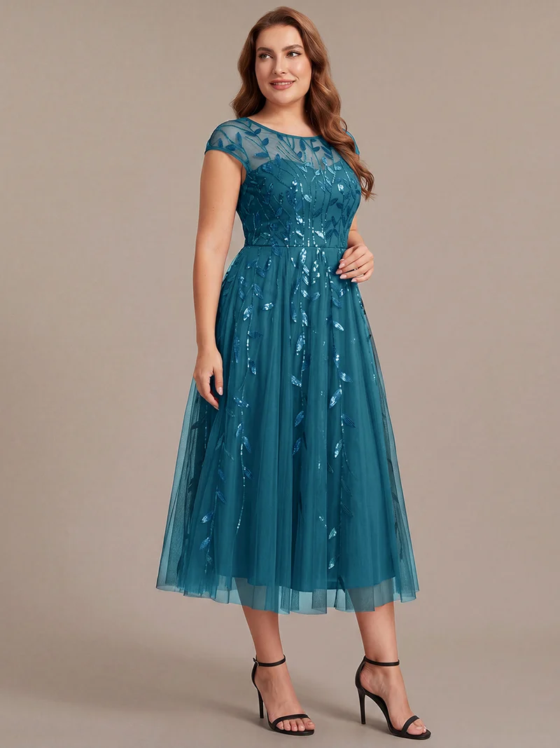 Robe invitée mariage grande taille à paillettes coupe trapèze