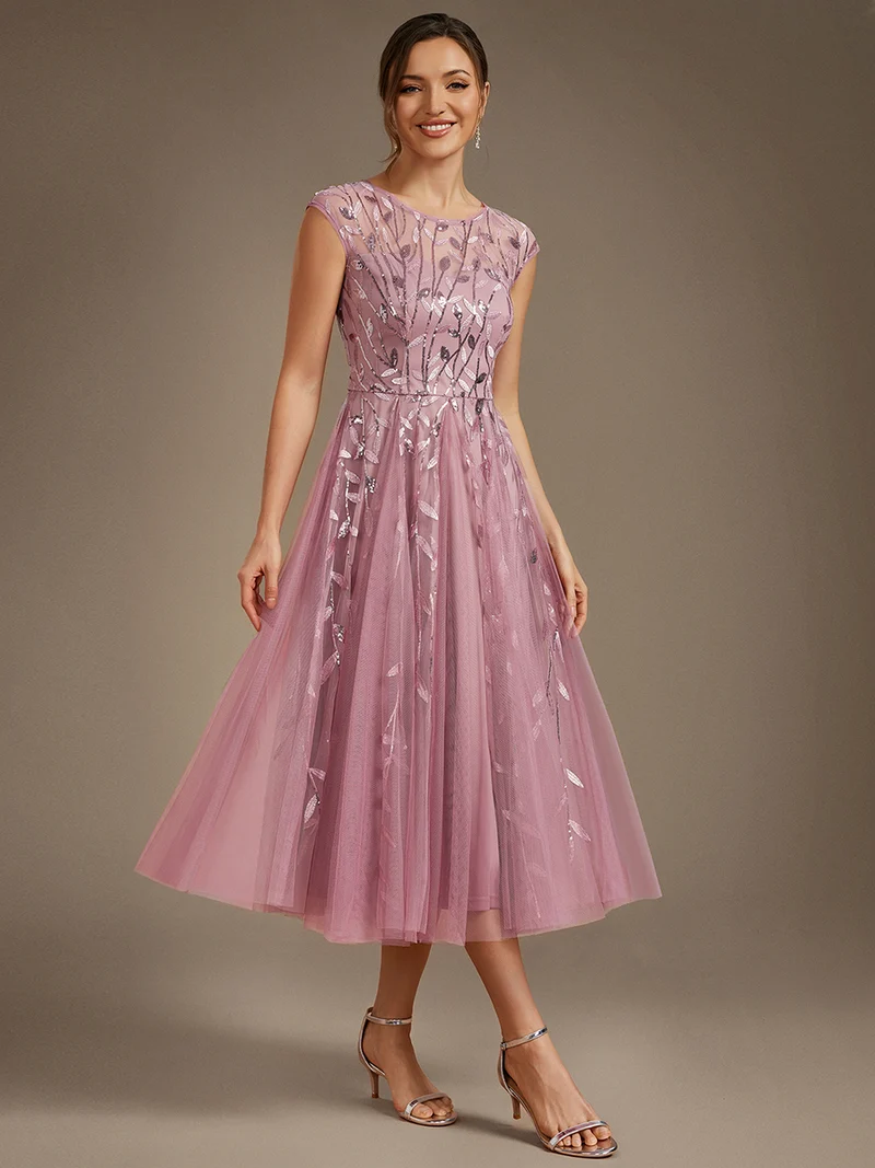 Robe de soirée mi-longue à paillettes avec manches cape