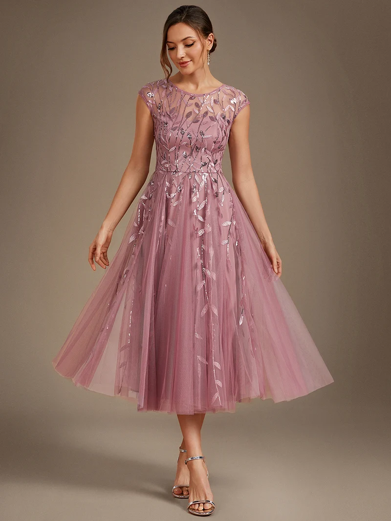 Robe de soirée mi-longue à paillettes avec manches cape