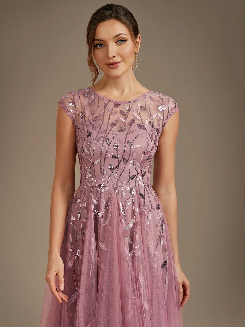 Robe de soirée mi-longue à paillettes avec manches cape