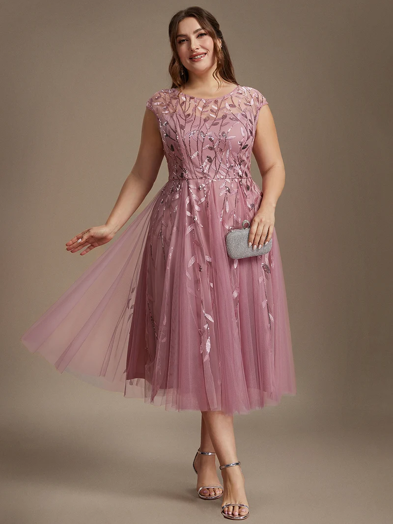 Robe invitée mariage grande taille à paillettes coupe trapèze