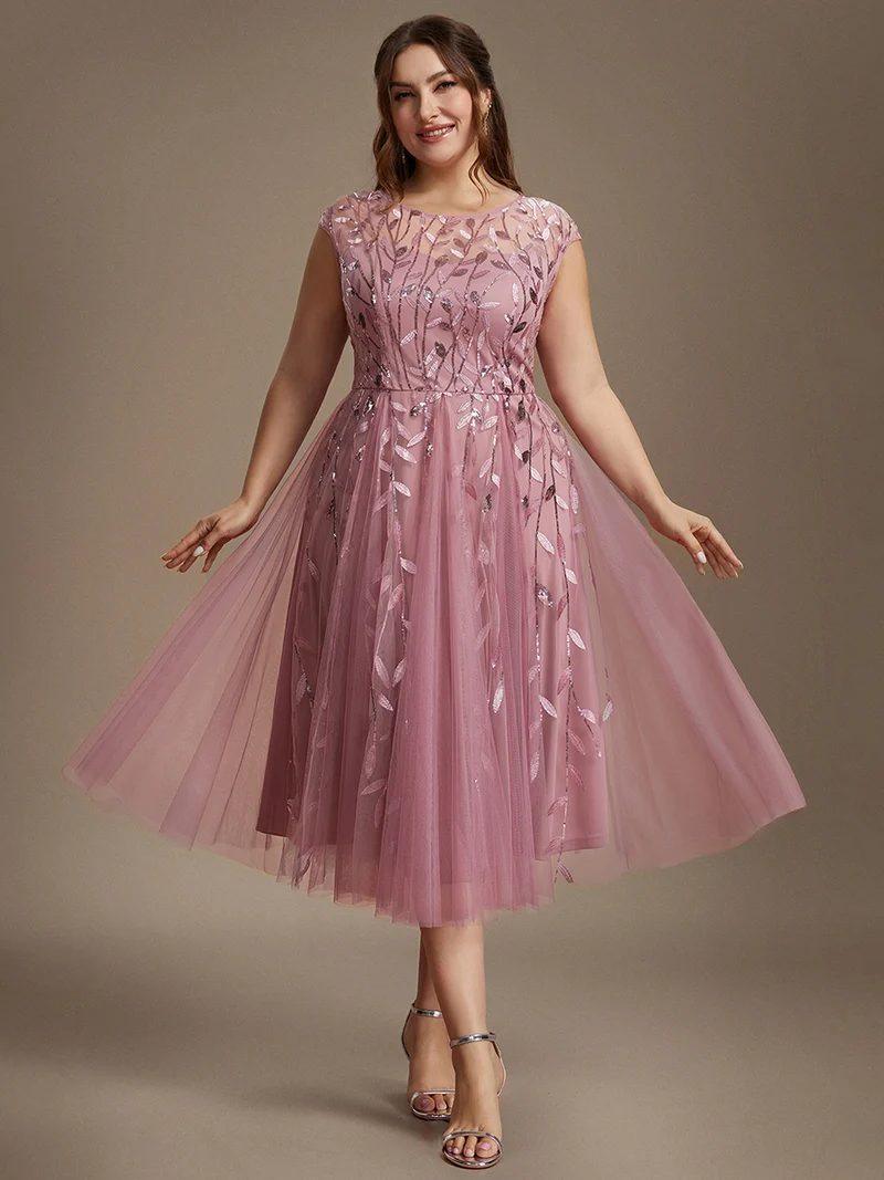 Robe invitée mariage grande taille à paillettes coupe trapèze