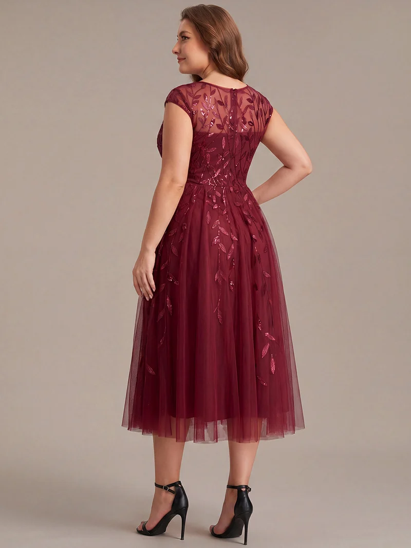 Robe invitée mariage grande taille à paillettes coupe trapèze