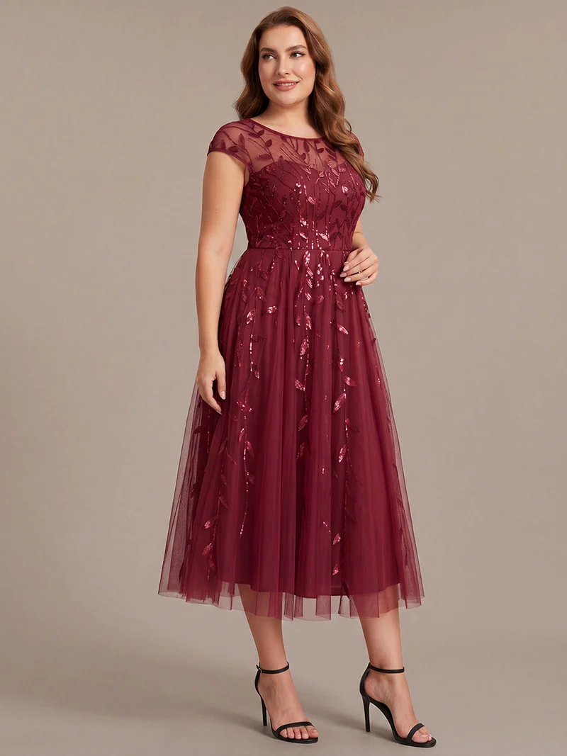 Robe invitée mariage grande taille à paillettes coupe trapèze