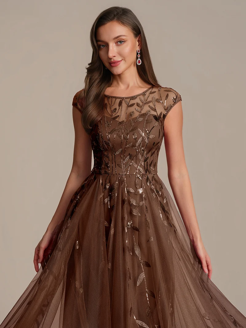 Robe de soirée mi-longue à paillettes avec manches cape