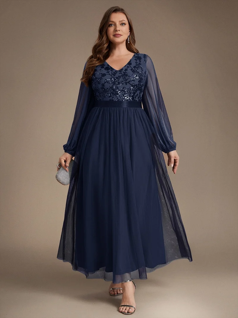 Robe longue en tulle à paillettes et manches bouffantes