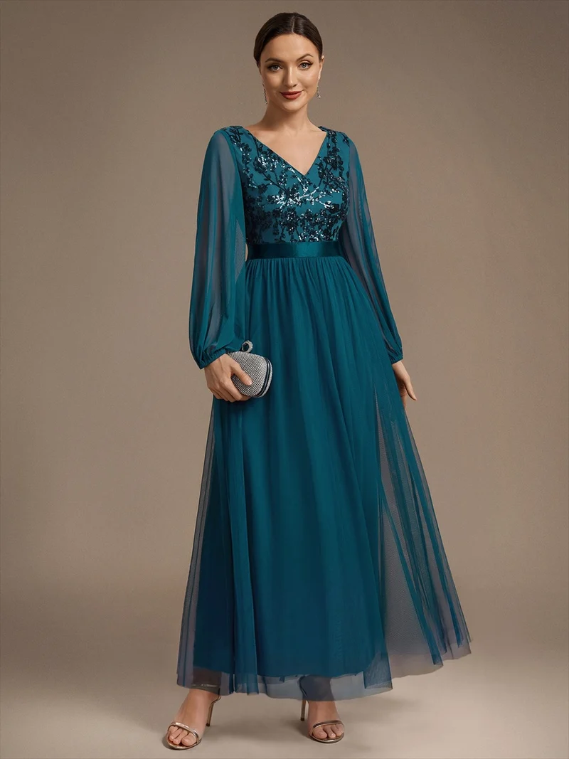 Robe longue en tulle à paillettes et manches bouffantes
