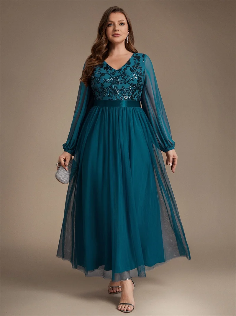 Robe longue en tulle à paillettes et manches bouffantes