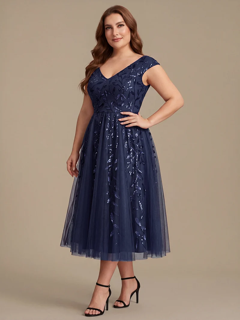 Robe midi sans manches col en V à sequins et coupe évasée
