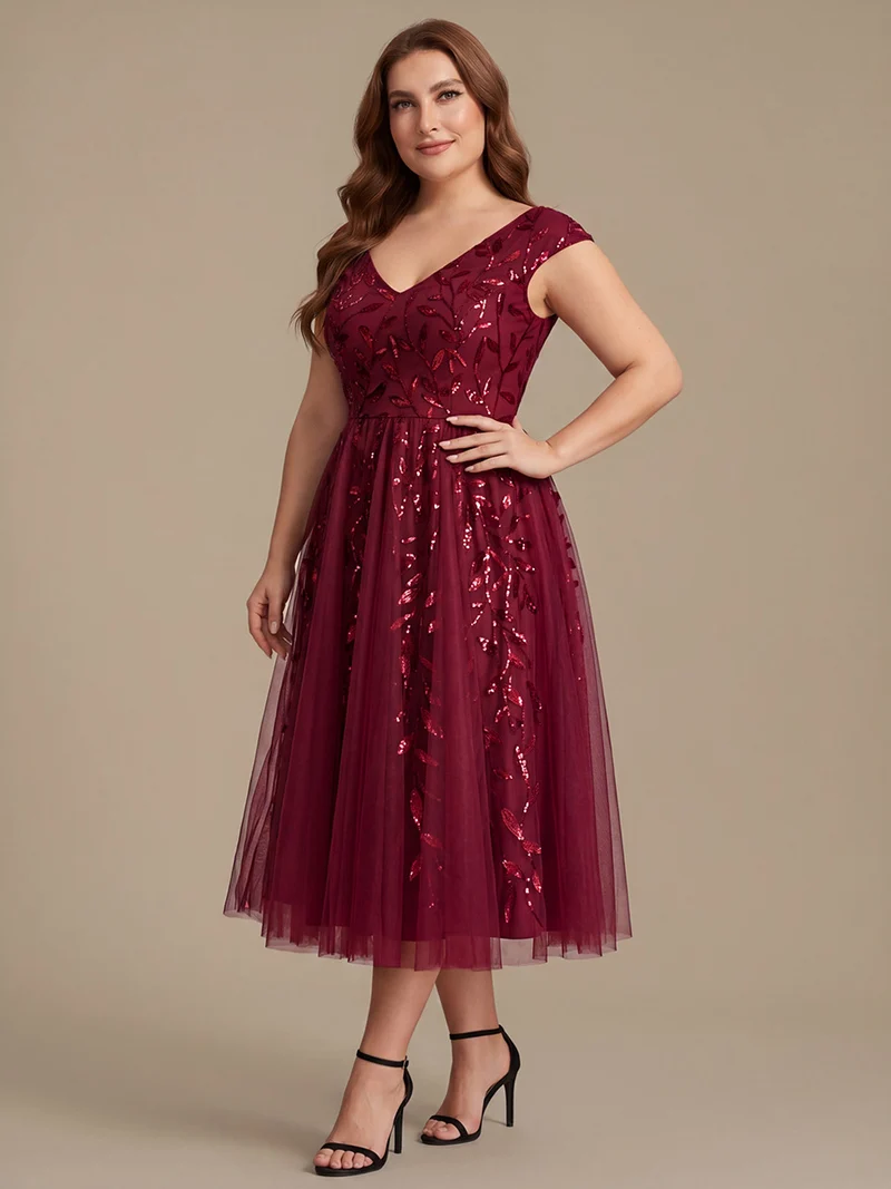 Robe midi sans manches col en V à sequins et coupe évasée