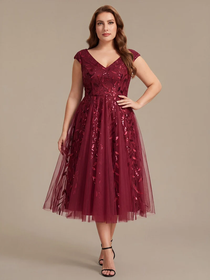 Robe midi sans manches col en V à sequins et coupe évasée