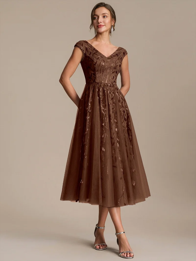 Robe invitée mariage grande taille à paillettes coupe trapèze